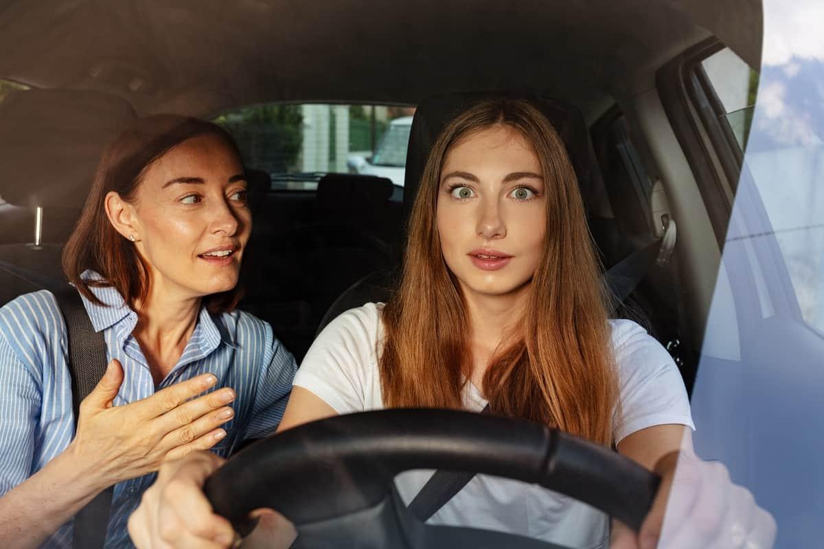 Her mother drives her to school. Singer leader mother Driver.